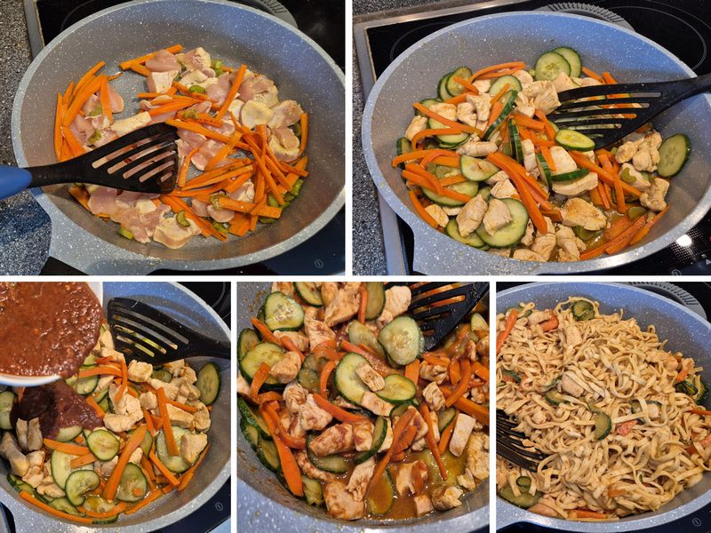 Breite Mie-Nudeln mit gebratenem Hähnchen in cremiger Erdnusssauce